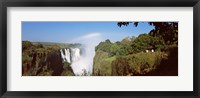 Tourists at a viewing point looking at the rainbow formed over Victoria Falls, Zimbabwe Fine Art Print