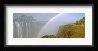 Rainbow form in the spray created by the water cascading over the Victoria Falls, Zimbabwe Fine Art Print