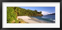 Waves breaking on a small secluded beach on North Island, Seychelles Fine Art Print