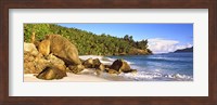 Rocks on a small beach on North Island, Seychelles Fine Art Print