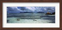 Snorkeler in the clean waters on Anse Source d'Argent beach, La Digue Island, Seychelles Fine Art Print
