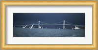 Storm approaches sailboats racing past Rose Island lighthouse and Newport Bridge in Narragansett Bay, Newport, Rhode Island USA Fine Art Print