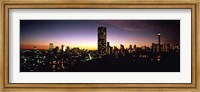 Buildings in a city lit up at night, Johannesburg, South Africa Fine Art Print
