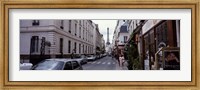 Buildings along a street with the Eiffel Tower in the background, Paris, France Fine Art Print