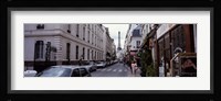 Buildings along a street with the Eiffel Tower in the background, Paris, France Fine Art Print
