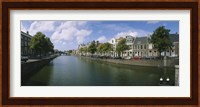 Buildings along a canal, Haarlem, Netherlands Fine Art Print