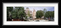 Netherlands, Amsterdam, Boats in canal Fine Art Print