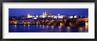 Bridge across a river lit up at night, Charles Bridge, Vltava River, Prague, Czech Republic Fine Art Print