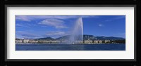 Fountain in front of buildings, Jet D'eau, Geneva, Switzerland Fine Art Print