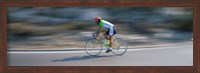 Bike racer participating in a bicycle race, Sitges, Barcelona, Catalonia, Spain Fine Art Print