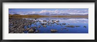 Rocks and pebbles in a lake, Torne Lake, Lapland, Sweden Fine Art Print