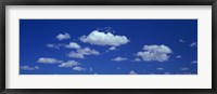 Clouds against a deep blue sky Fine Art Print