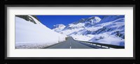 Empty road passing through a polar landscape, Route 3, Graubunden, Switzerland Fine Art Print