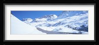 Snow covered mountains on both sides of a road, St Moritz, Graubunden, Switzerland Fine Art Print