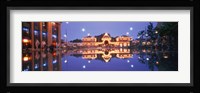 Buildings in an amusement park lit up at dusk, Tivoli Gardens, Copenhagen, Denmark Fine Art Print
