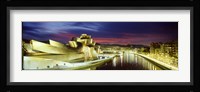 Buildings lit up at dusk, Guggenheim Museum Bilbao, Bilbao, Vizcaya, Spain Fine Art Print