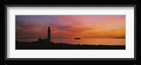 Silhouette of a lighthouse at sunset, Scotland Fine Art Print