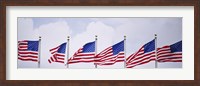 Low angle view of American flags fluttering in wind Fine Art Print