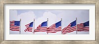 Low angle view of American flags fluttering in wind Fine Art Print