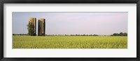 USA, Arkansas, View of grain silos in a field Fine Art Print