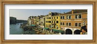 Tourists looking at gondolas in a canal, Venice, Italy Fine Art Print