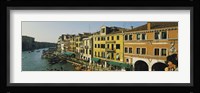 Tourists looking at gondolas in a canal, Venice, Italy Fine Art Print