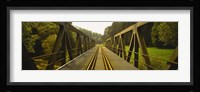 Railroad tracks passing through a bridge, Germany Fine Art Print