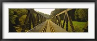 Railroad tracks passing through a bridge, Germany Fine Art Print