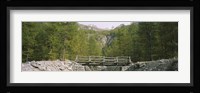 Wooden footbridge across a stream in a mountain range, Switzerland Fine Art Print
