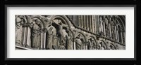Low angle view of statues carved on wall of a cathedral, Trondheim, Norway Fine Art Print