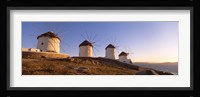Low angle view of traditional windmills, Mykonos, Cyclades Islands, Greece Fine Art Print
