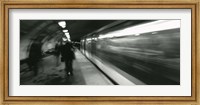 Subway train passing through a subway station, London, England Fine Art Print