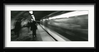 Subway train passing through a subway station, London, England Fine Art Print