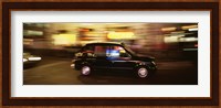 England, London, Black cab in the night Fine Art Print