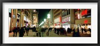 Buildings in a city lit up at night, Munich, Germany Fine Art Print