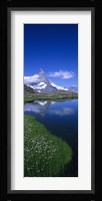 Reflection of a mountain in water, Riffelsee, Matterhorn, Switzerland Fine Art Print