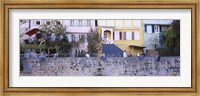 Low Angle View Of A Group Of People Sitting On A Wall, Tubingen, Baden-Wurttemberg, Germany Fine Art Print