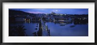 High angle view of buildings lit up at dusk, Charles Bridge, Vltava River, Prague, Czech Republic Fine Art Print