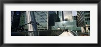 Bridge in front of buildings, Canary Wharf, London, England Fine Art Print