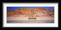 Bench in front of rocks, Red Rock Canyon State Park, Nevada, USA Fine Art Print