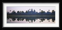 Reflection of temples and palm trees in a lake, Angkor Wat, Cambodia Fine Art Print