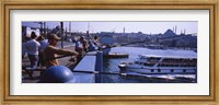 Side profile of fishermen fishing in a river, Galata Bridge, Istanbul, Turkey Fine Art Print