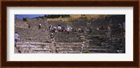 Tourists at old ruins of an amphitheater, Odeon, Ephesus, Turkey Fine Art Print