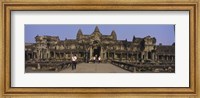 Tourists walking in front of an old temple, Angkor Wat, Siem Reap, Cambodia Fine Art Print