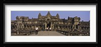 Tourists walking in front of an old temple, Angkor Wat, Siem Reap, Cambodia Fine Art Print