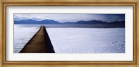 Jetty over a frozen lake, Chiemsee, Bavaria, Germany Fine Art Print