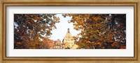 Low angle view of buildings viewed through trees, Bietigheim, Baden-Wurttemberg, Germany Fine Art Print