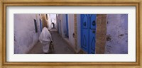 Rear view of a woman walking on the street, Medina, Kairwan, Tunisia Fine Art Print