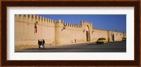 Car on a road in front of a fortified wall, Medina, Kairwan, Tunisia Fine Art Print