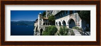 Walkway along a building at a lake, Santa Caterina del Sasso, Lake Maggiore, Piedmont, Italy Fine Art Print